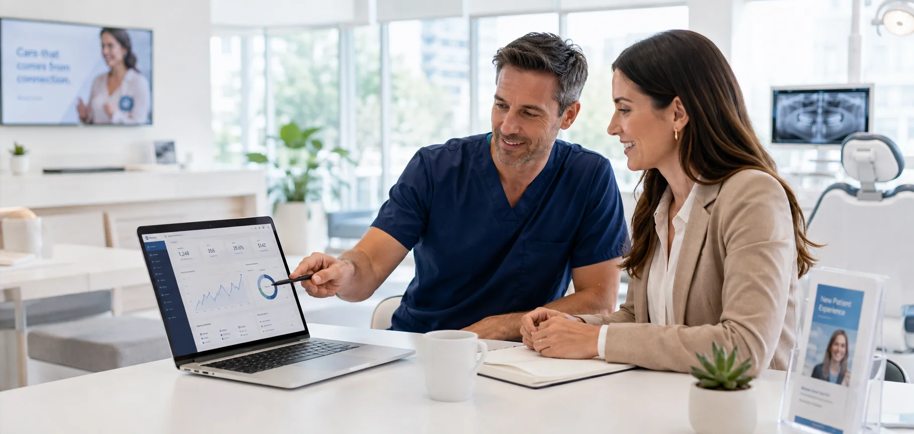 Healthcare provider and patient reviewing a focused landing page strategy on a laptop