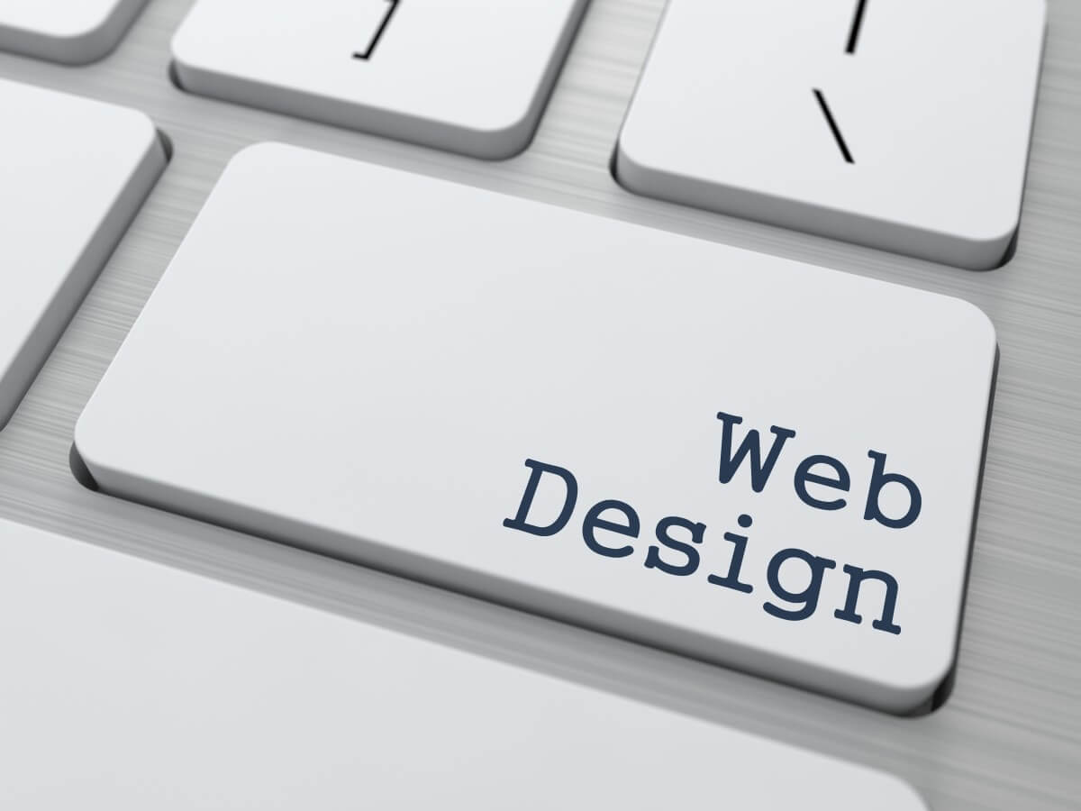 web-design-business-concept-button-modern-computer-keyboard.jpg