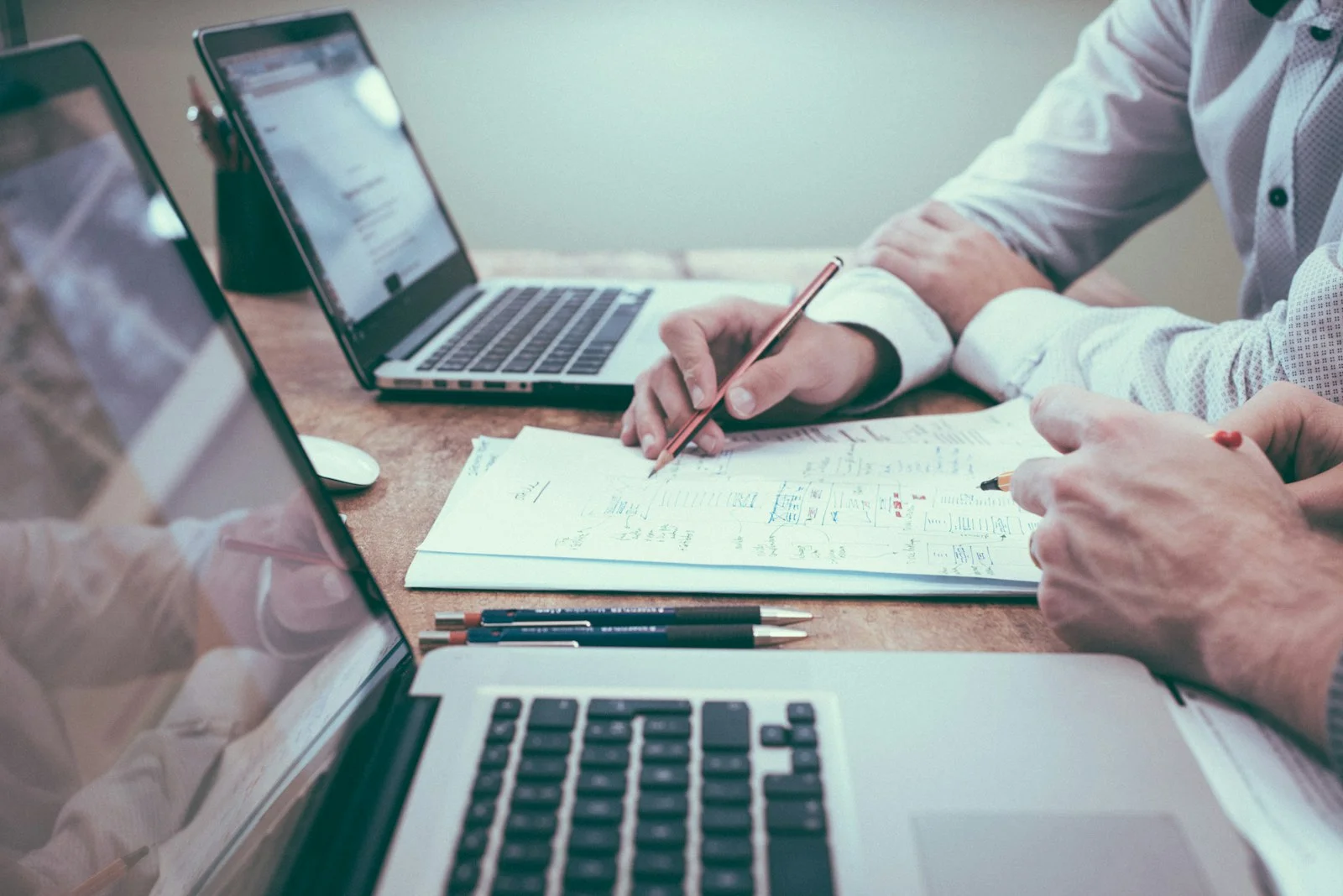 Healthcare compliance professional reviewing advertising claims and patient data documentation