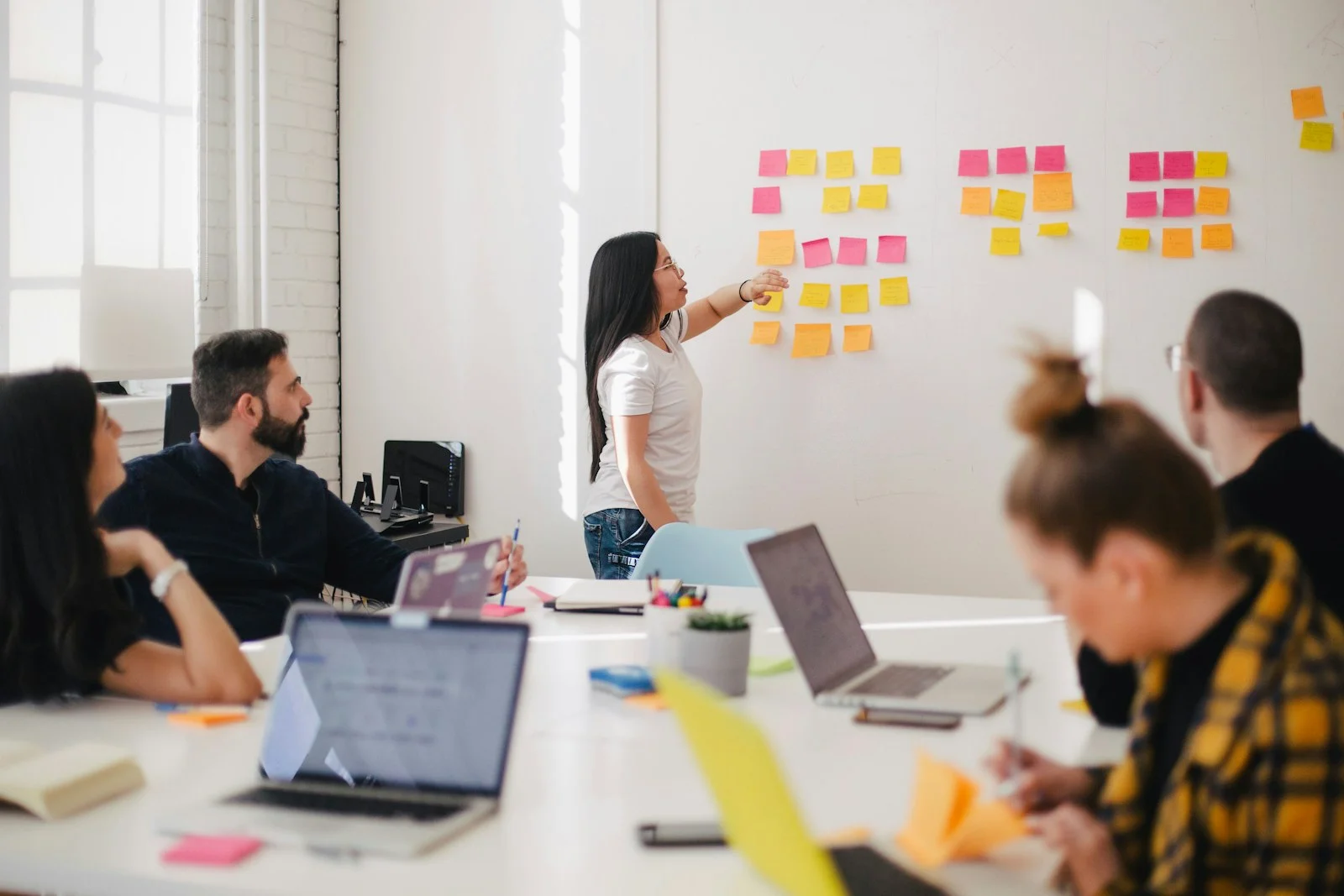 Marketing team collaborating on a customer-first digital strategy