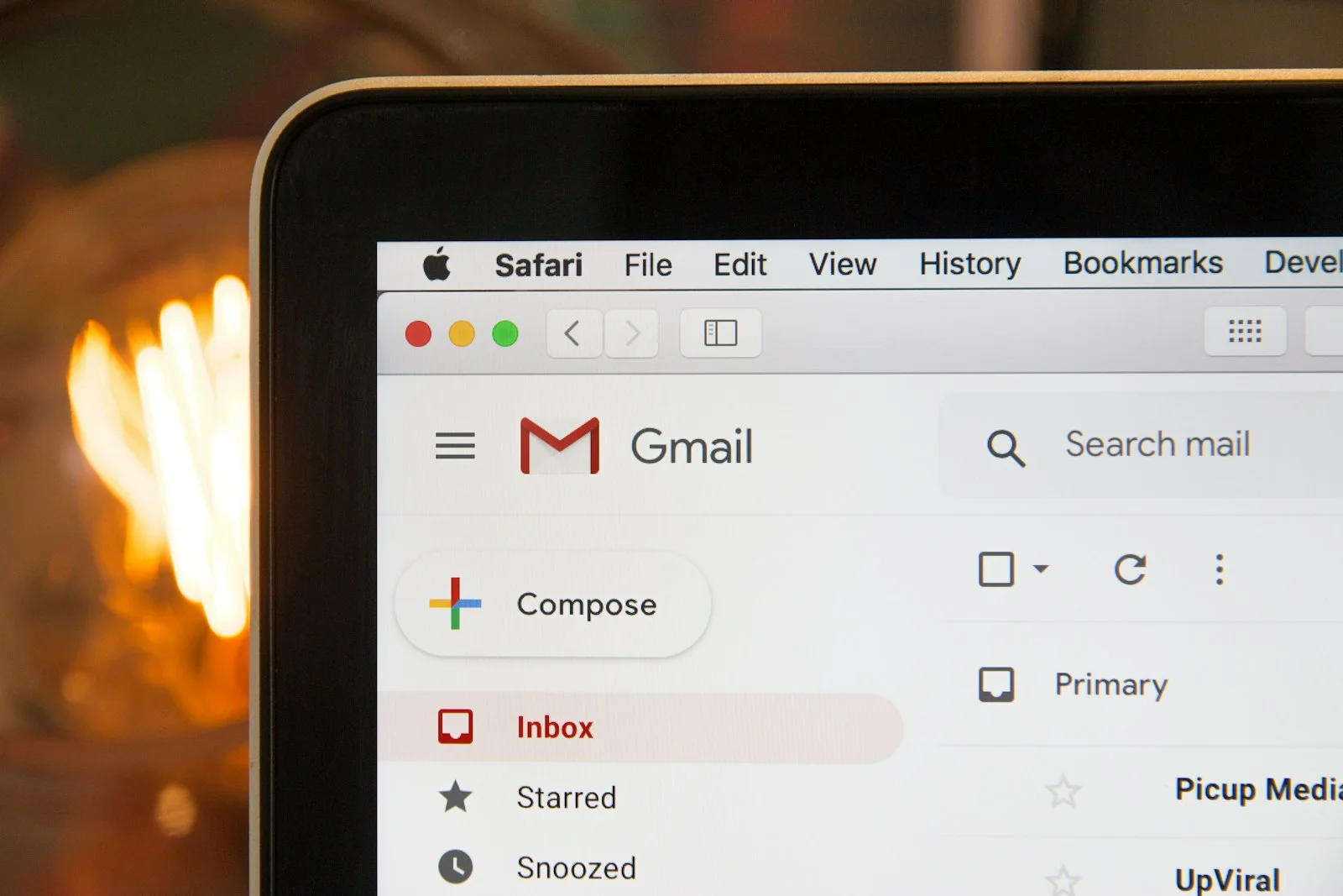 Healthcare marketing professional reviewing email deliverability and compliance metrics